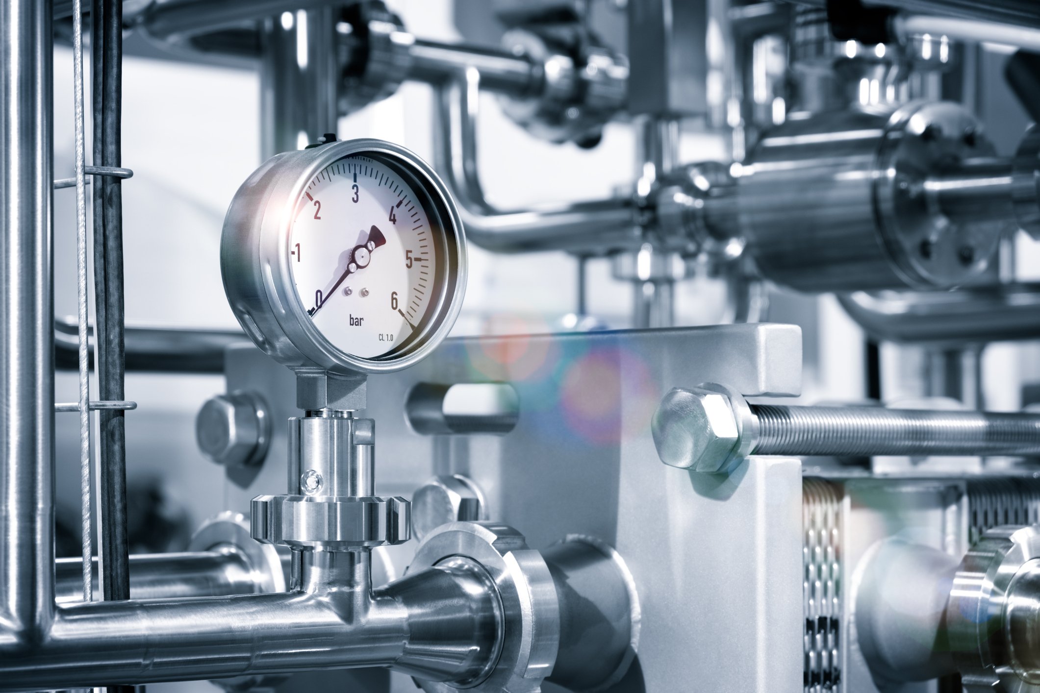 pressure meter in a liquid processing plant - iStock-1208602762
